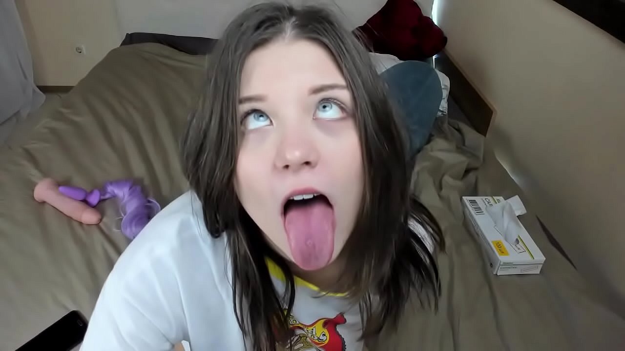 Katia sucking a dildo and stimulating her pussy with an ohmibod